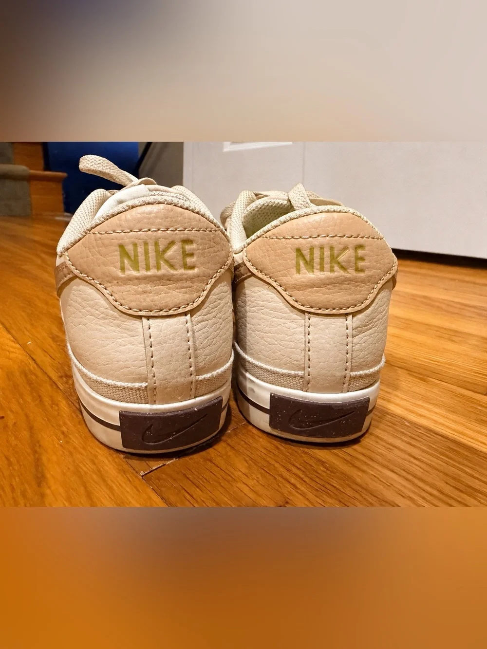 Nike Women’s Low-Top Sneakers in Cream with Tan Swoosh